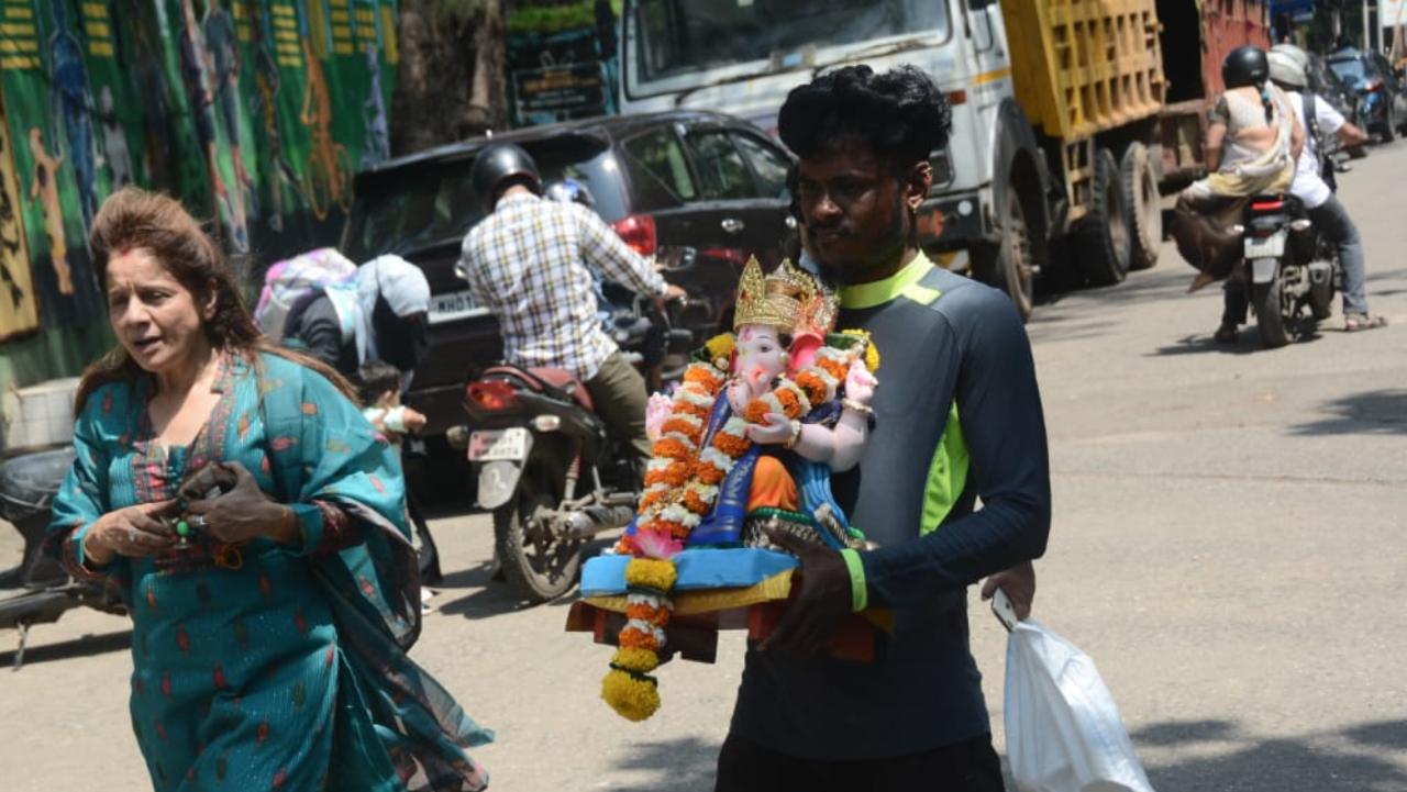 After one-and-a-half days, many devotees bid adieu to the lord Ganesha